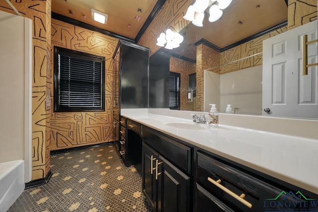 bathroom featuring vanity and shower / tub combination