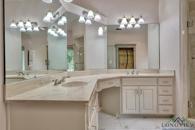 bathroom featuring vanity and a shower with door