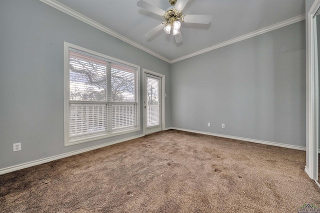 carpeted empty room featuring crown molding and ceiling fan