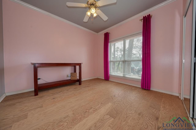 unfurnished room featuring ceiling fan, ornamental molding, and light hardwood / wood-style floors