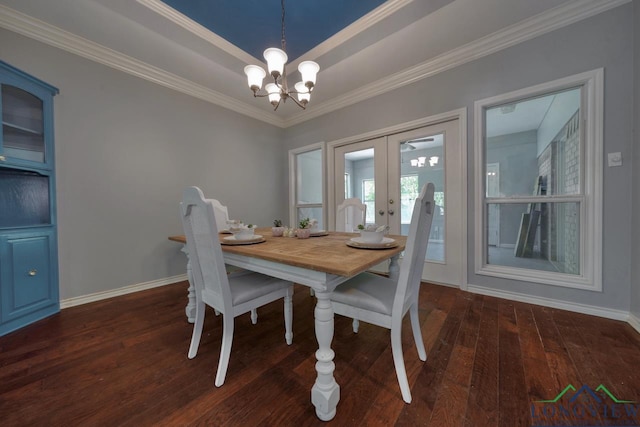519 Hideaway Ln E, Hideaway, TX 75771 - dining space featuring a notable chandelier, french doors, dark wood-style flooring, and ornamental molding