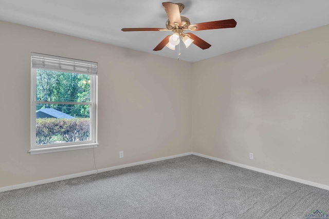 1702 Eastwood St, Longview, TX 75604 - carpeted spare room featuring ceiling fan and baseboards