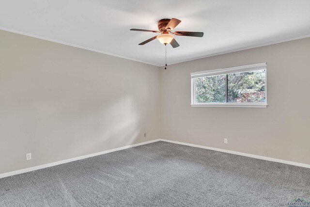 1702 Eastwood St, Longview, TX 75604 - carpeted spare room featuring a ceiling fan and ornamental molding