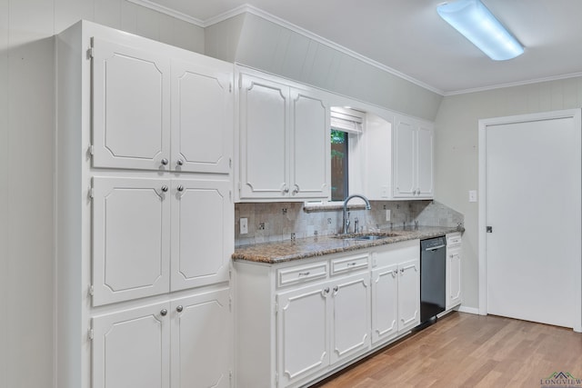 1702 Eastwood St, Longview, TX 75604 - kitchen with dishwasher, crown molding, white cabinetry, decorative backsplash, and light wood-style floors