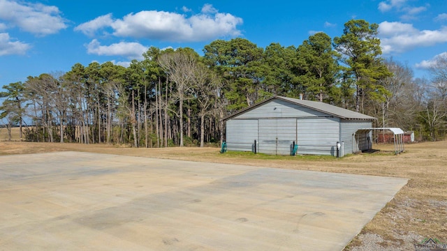 exterior space with a carport