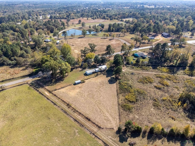 aerial view with a rural view and a water view