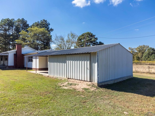 garage with a yard