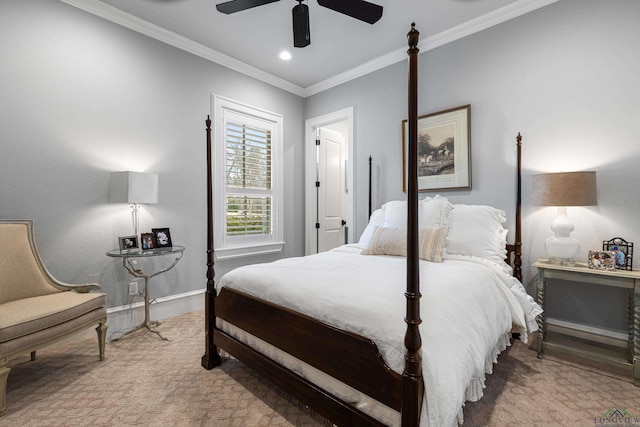 bedroom with carpet, baseboards, a ceiling fan, and ornamental molding