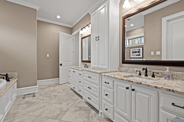 full bath with crown molding, a sink, baseboards, and double vanity