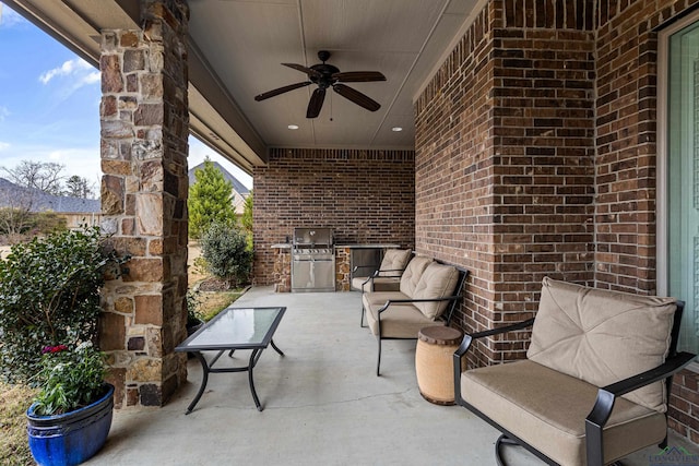 view of patio featuring ceiling fan and area for grilling