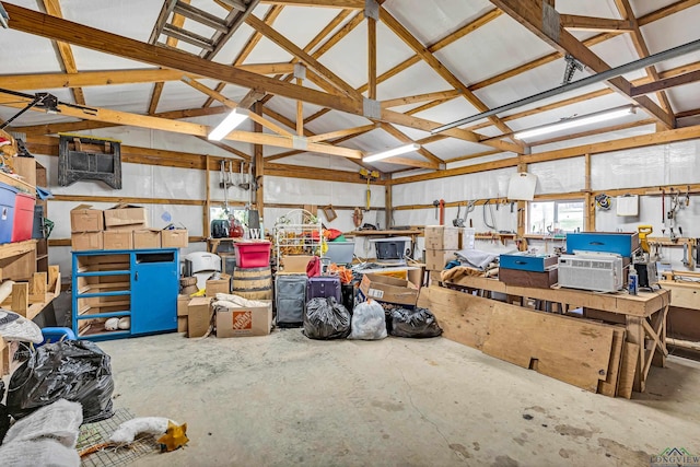 garage with a workshop area