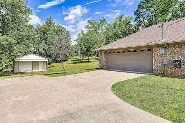 garage with a lawn