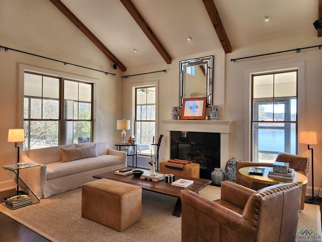 living room with wood-type flooring and vaulted ceiling with beams