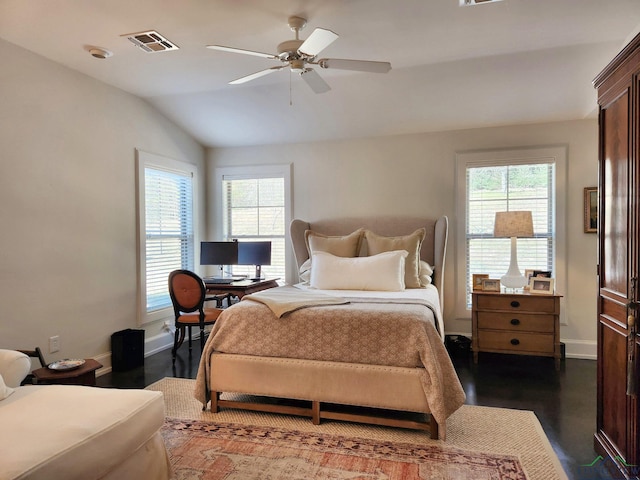 bedroom with lofted ceiling, dark wood-type flooring, and ceiling fan