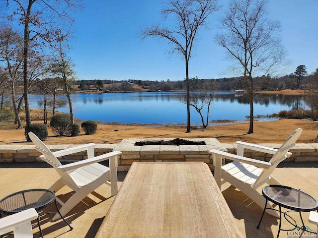 wooden terrace with a water view