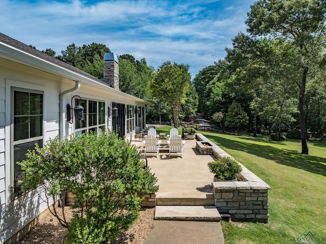 435 Acr 3763, Palestine, TX 75801 - view of patio / terrace with view of wooded area