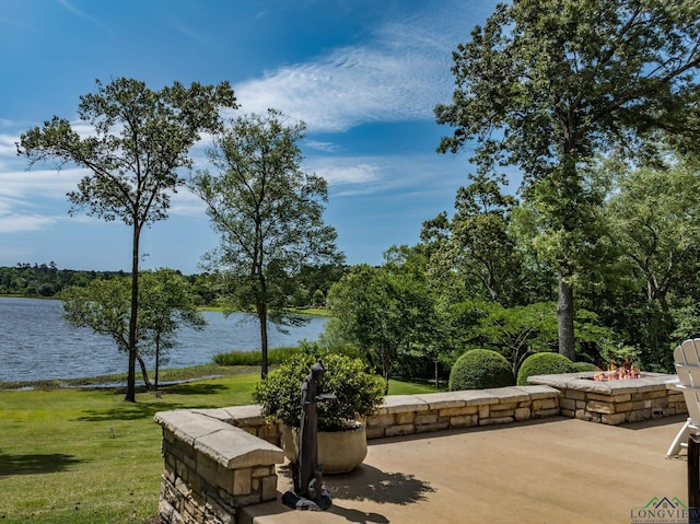 435 Acr 3763, Palestine, TX 75801 - view of patio / terrace with a fire pit and a water view