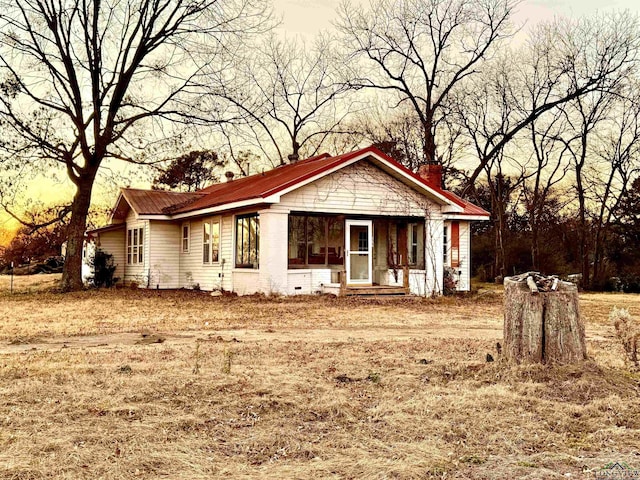 304 Daingerfield St, Naples, TX 75568 - view of front of house with a chimney
