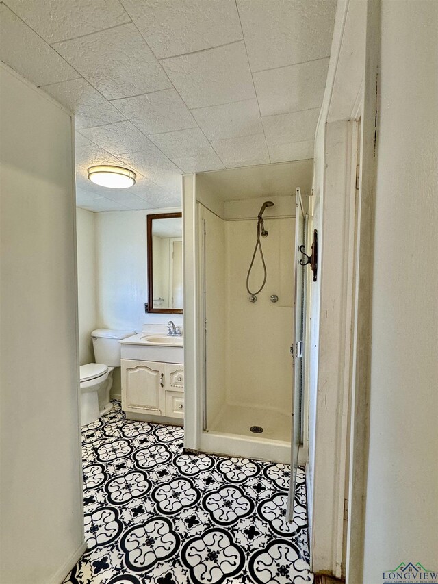 unfurnished bedroom featuring multiple closets, ceiling fan, crown molding, and light carpet