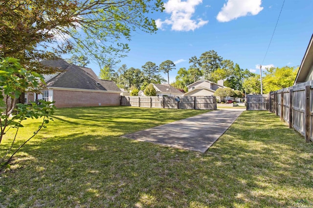 view of yard featuring a fenced backyard