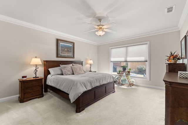 bedroom with baseboards, visible vents, ceiling fan, ornamental molding, and light colored carpet