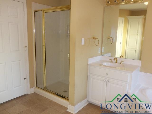 bathroom with vanity and an enclosed shower