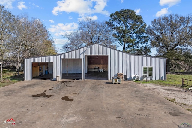 view of outbuilding featuring a garage