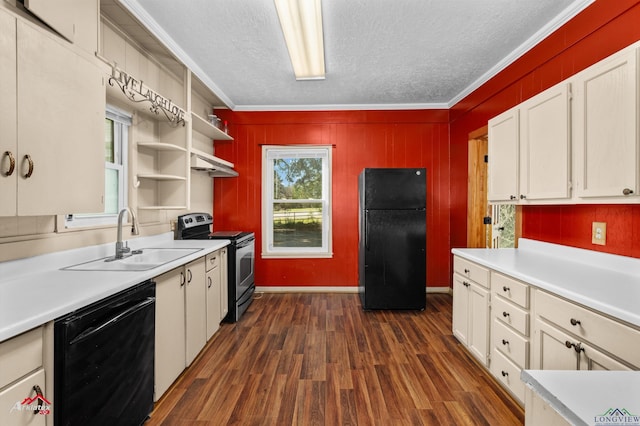 kitchen with sink, dark hardwood / wood-style flooring, crown molding, a textured ceiling, and black appliances