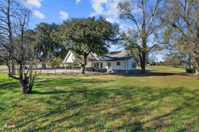 view of yard with a carport