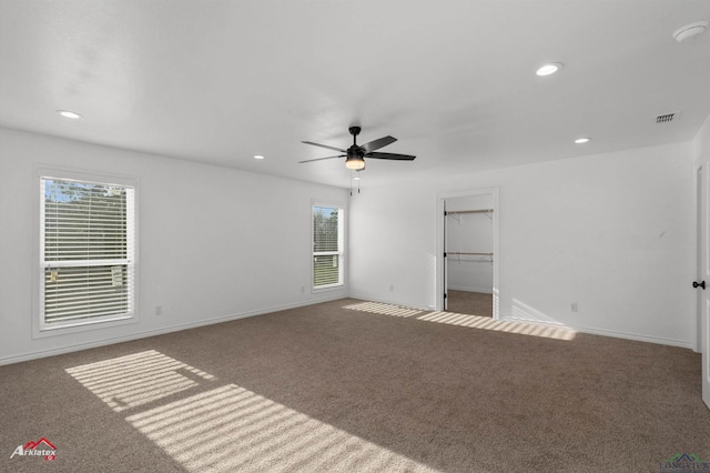 unfurnished bedroom with visible vents, recessed lighting, and carpet