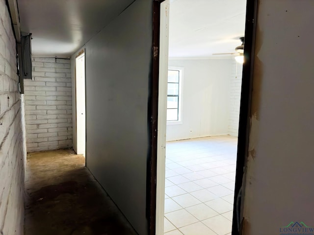 corridor with light tile patterned flooring