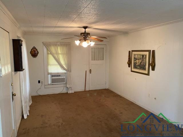 empty room with ceiling fan, cooling unit, carpet floors, and ornamental molding