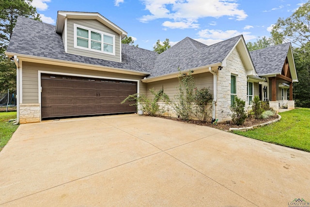 craftsman house featuring a garage