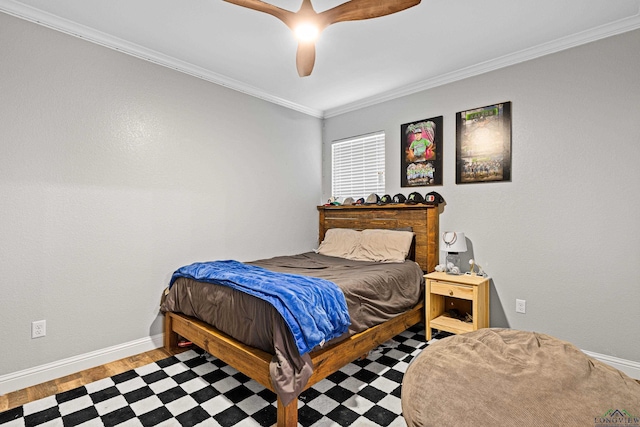 bedroom featuring light hardwood / wood-style flooring, ceiling fan, and ornamental molding