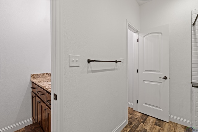 bathroom featuring hardwood / wood-style floors and vanity