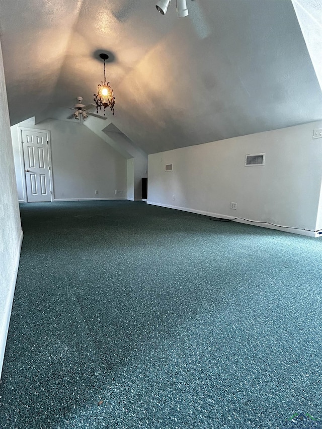 bonus room with visible vents, vaulted ceiling, and baseboards