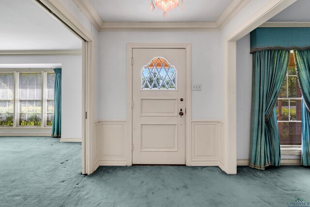 15 Covington Dr, Longview, TX 75602 - entryway with carpet, ornamental molding, and a wainscoted wall