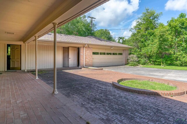 15 Covington Dr, Longview, TX 75602 - garage featuring driveway