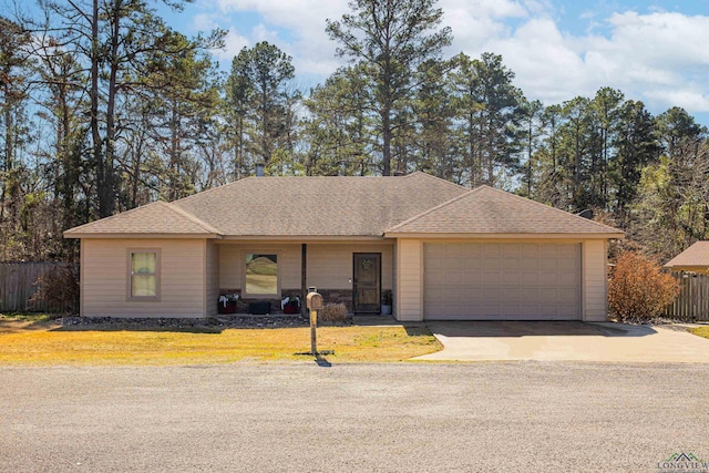 ranch-style house featuring an attached garage, a shingled roof, fence, and a front lawn