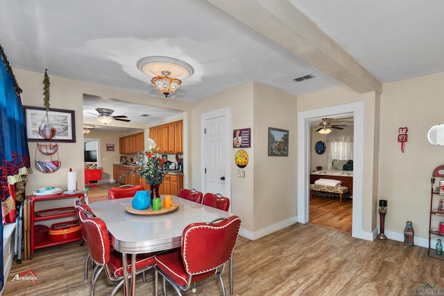 dining space featuring ceiling fan