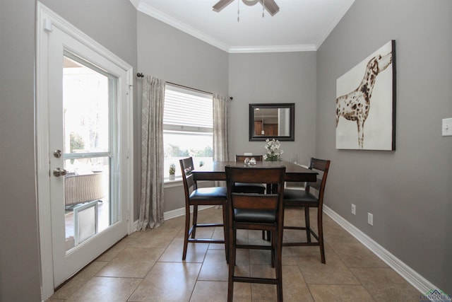 dining area with tile patterned flooring, crown molding, and ceiling fan