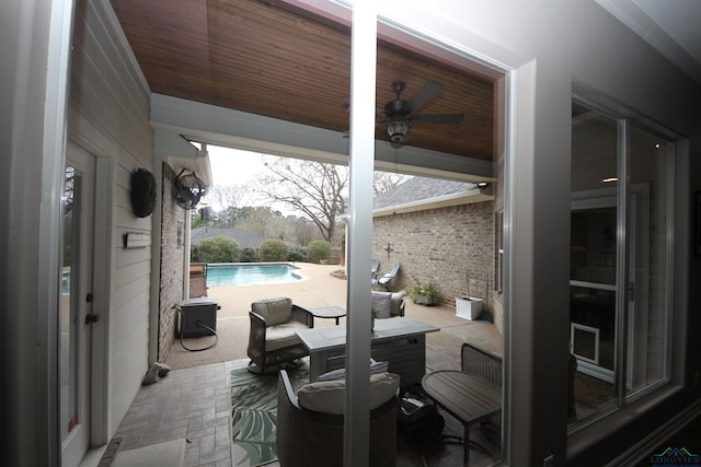 view of patio / terrace featuring ceiling fan