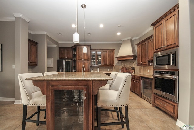 kitchen with pendant lighting, wine cooler, custom exhaust hood, a center island, and stainless steel appliances