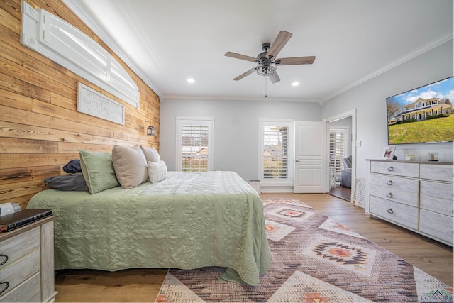 bedroom featuring ceiling fan, ornamental molding, wood finished floors, and recessed lighting