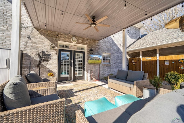 view of patio featuring an outdoor living space and a ceiling fan