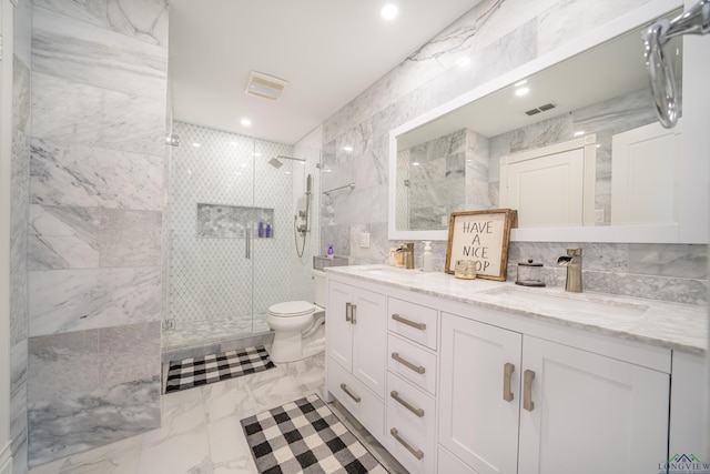 full bath with tile walls, visible vents, toilet, a sink, and a shower stall