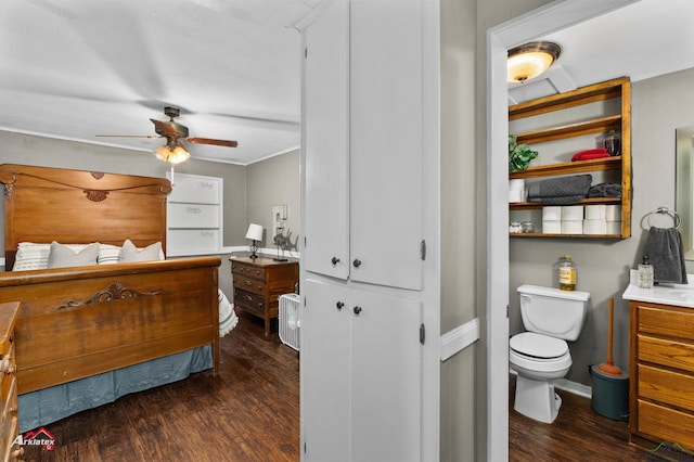 bedroom featuring dark wood-type flooring and ceiling fan