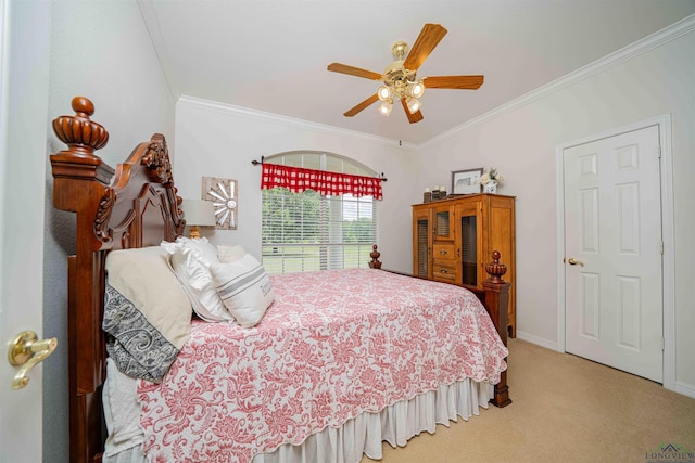 bedroom with a ceiling fan, baseboards, ornamental molding, and carpet