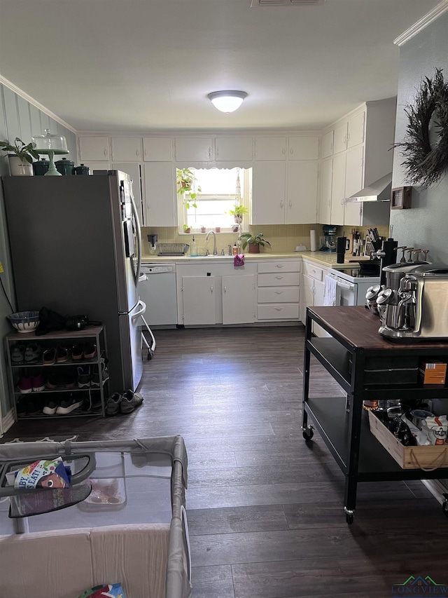 204 Mount Sylvan St, Lindale, TX 75771 - kitchen featuring white appliances, light countertops, white cabinets, and dark wood-style floors
