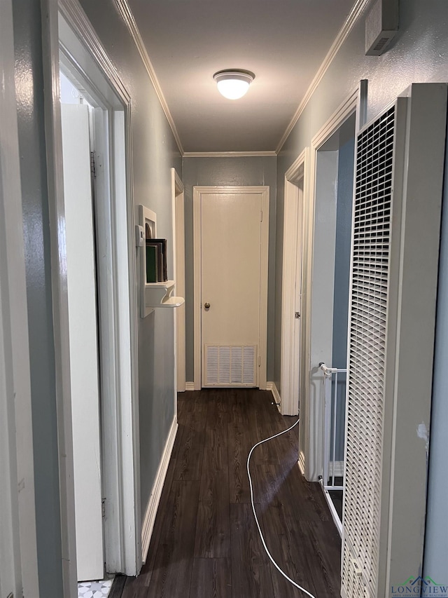 204 Mount Sylvan St, Lindale, TX 75771 - corridor featuring a heating unit, wood finished floors, and ornamental molding